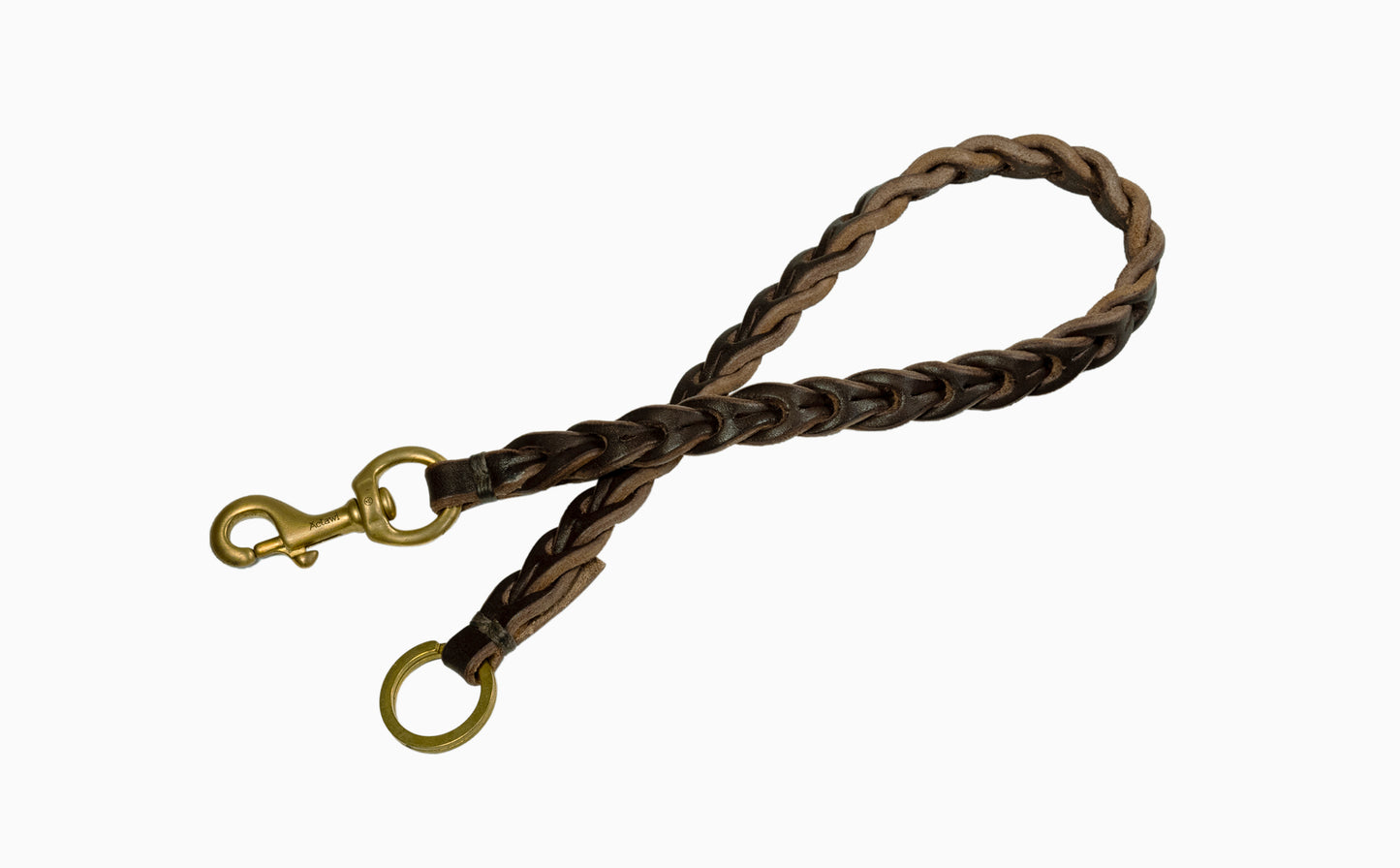 handcrafted braided chain / vegetable tanned bullhide leather with natural edge / signature solid brass snap hook / solid brass split ring / hand sewed with waxed linen thread / crafted in Italy