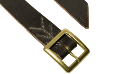 Detail of the buckle and tail of the dark brown vegetable tanned leather belt with a square buckle in raw brass, hand-sewn with waxed linen thread